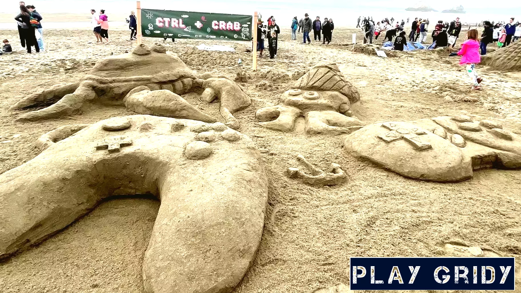 Students Triumph at Annual Sandcastle Competition with Creative Crab Design