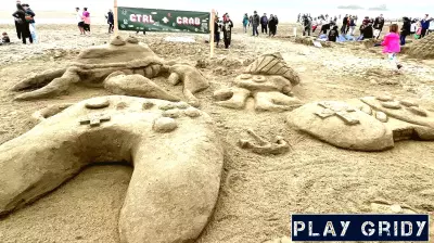 Students Triumph at Annual Sandcastle Competition with Creative Crab Design